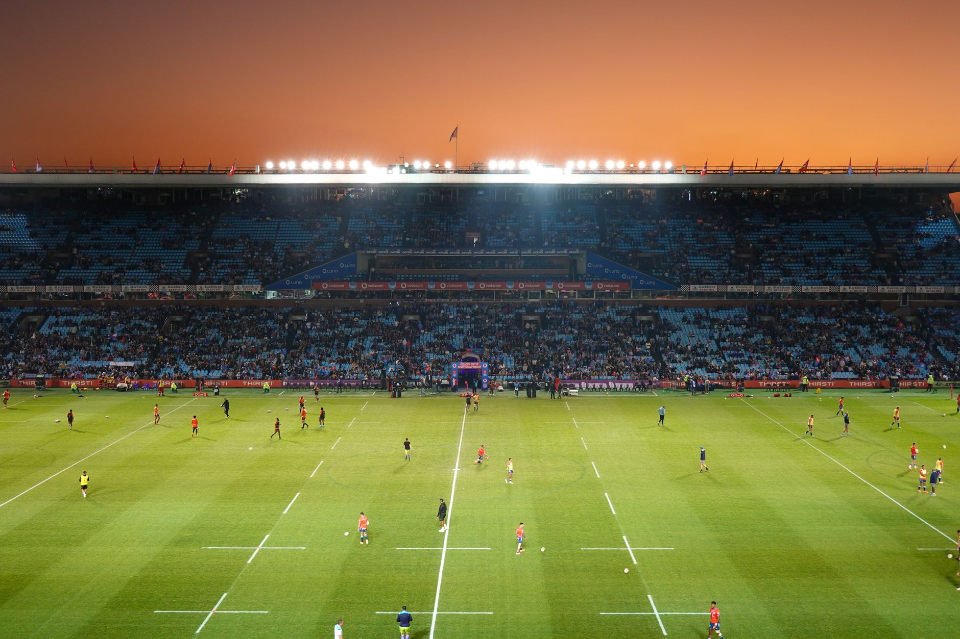 Fans watching live sports in a packed stadium, illustrating the best IPTV services for live sports streaming