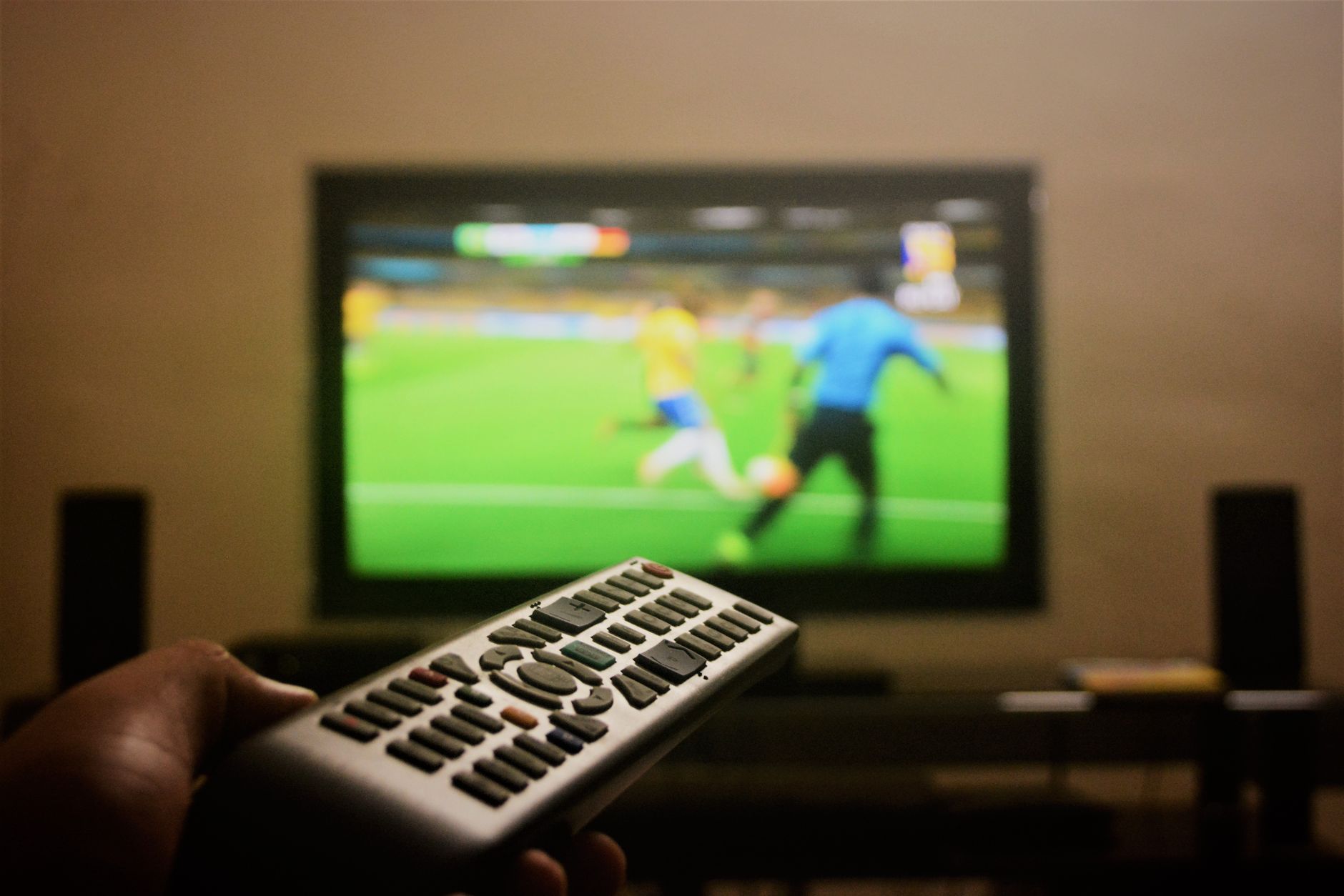 Watching a live football match on a TV using an IPTV service for sports streaming
